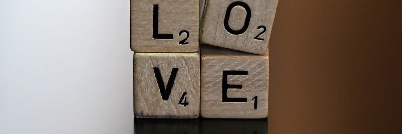 Scrabble tiles spelling words